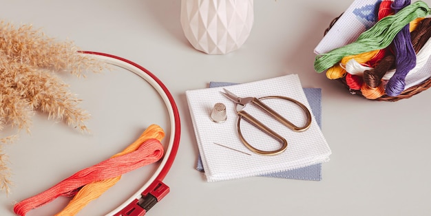 studio workspace with embroidery tools